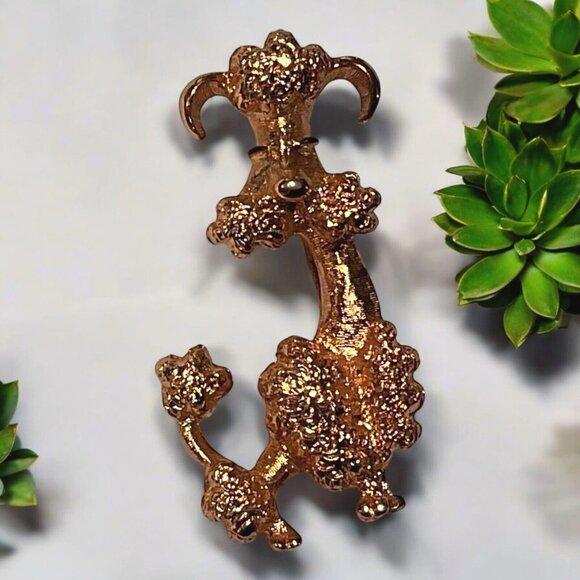 Vintage Poodle Sitting Textured Gold Tone Dog Brooch Pin Avon 2” Length by 3/4 - Picture 1 of 4